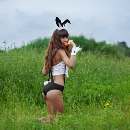 22876160-attractive-young-woman-wearing-costume-of-bunny-outdoors.jpg