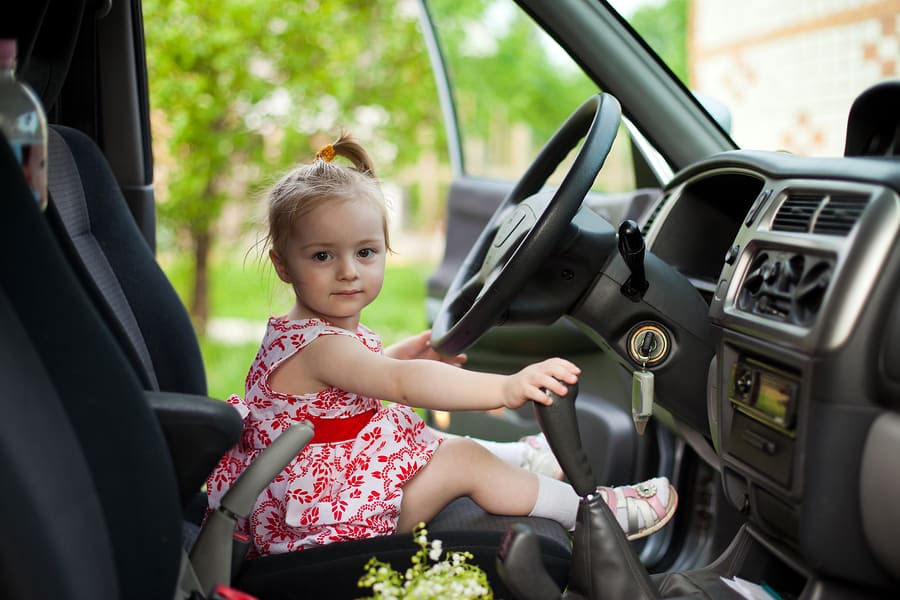 bigstock-Little-Girl-In-Car-61605149.jpg